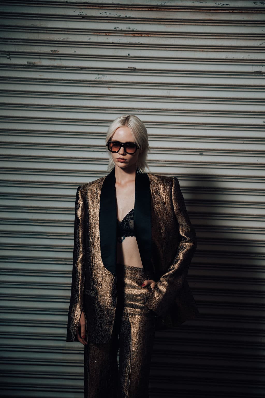 Model in a bronze tailored Cucculelli Shaheen look before the show.