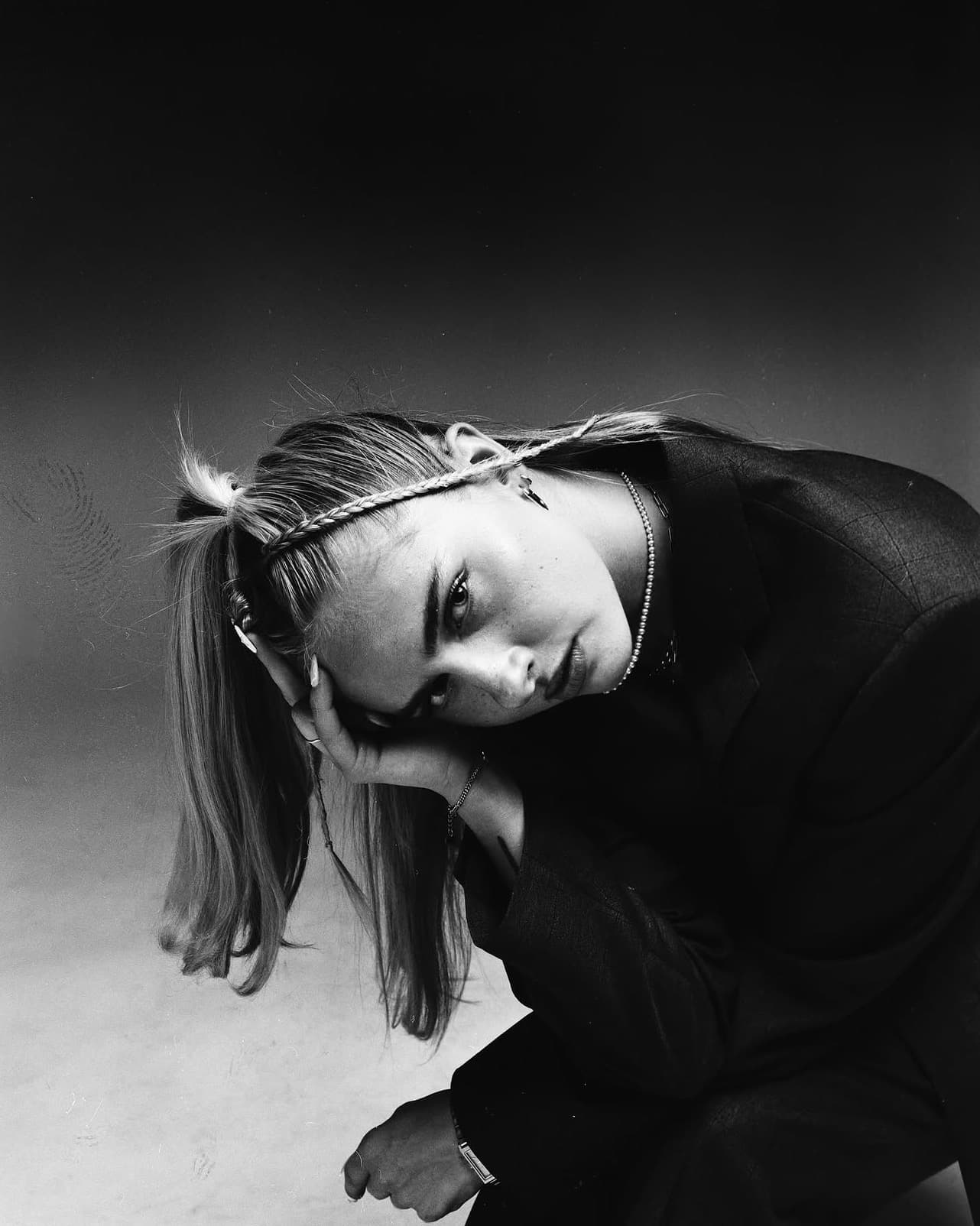 Black-and-white studio portrait of Hannah Warren.